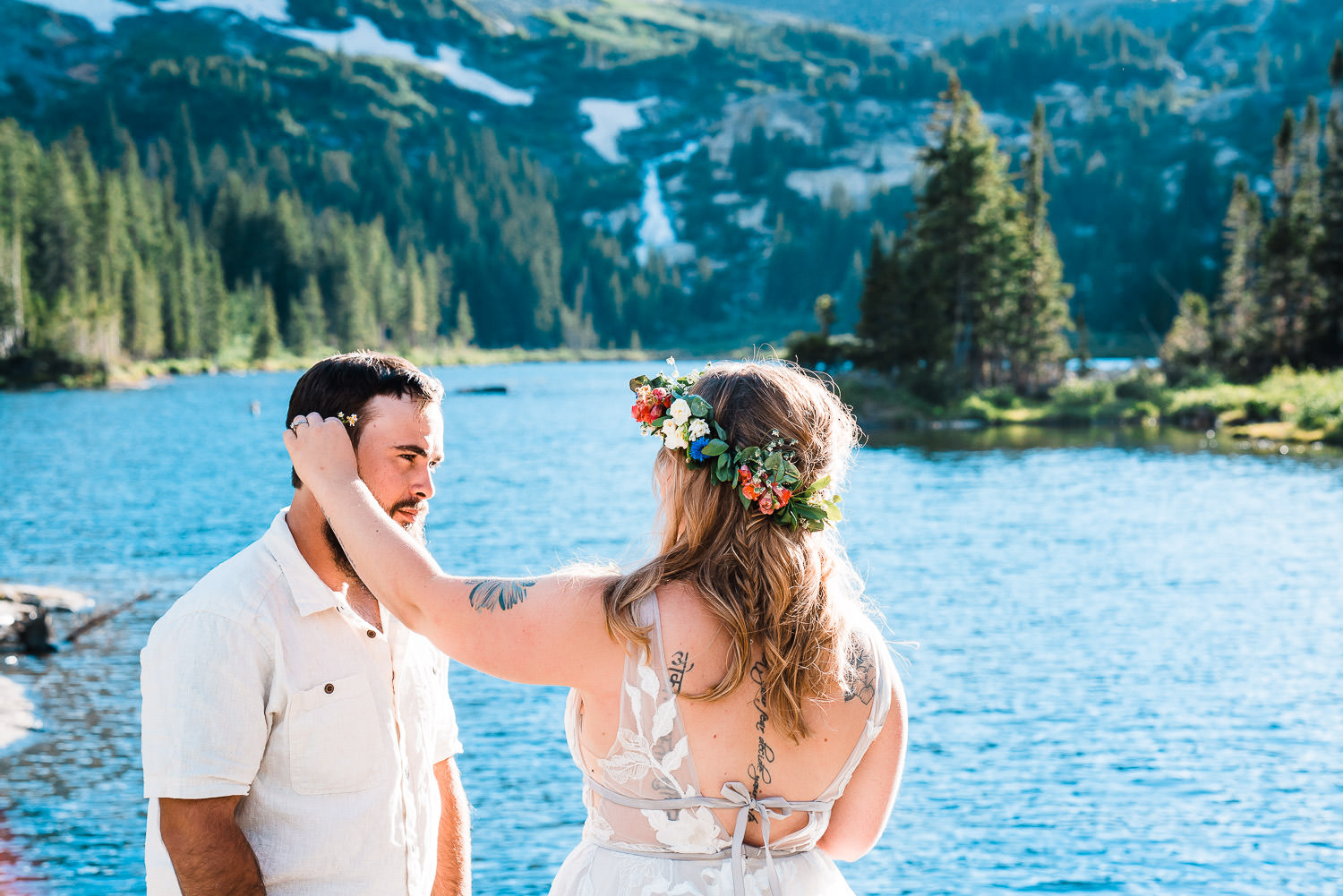 bride and groom exchange glances during their Blue Lakes Elopement