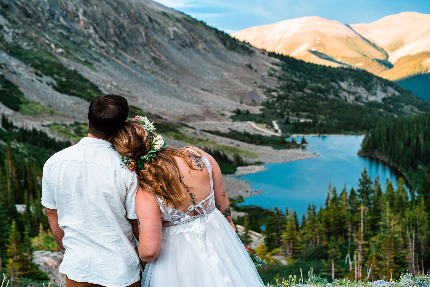 bride and groom in Breckenridge Colorado overlooking Blue Lakes
