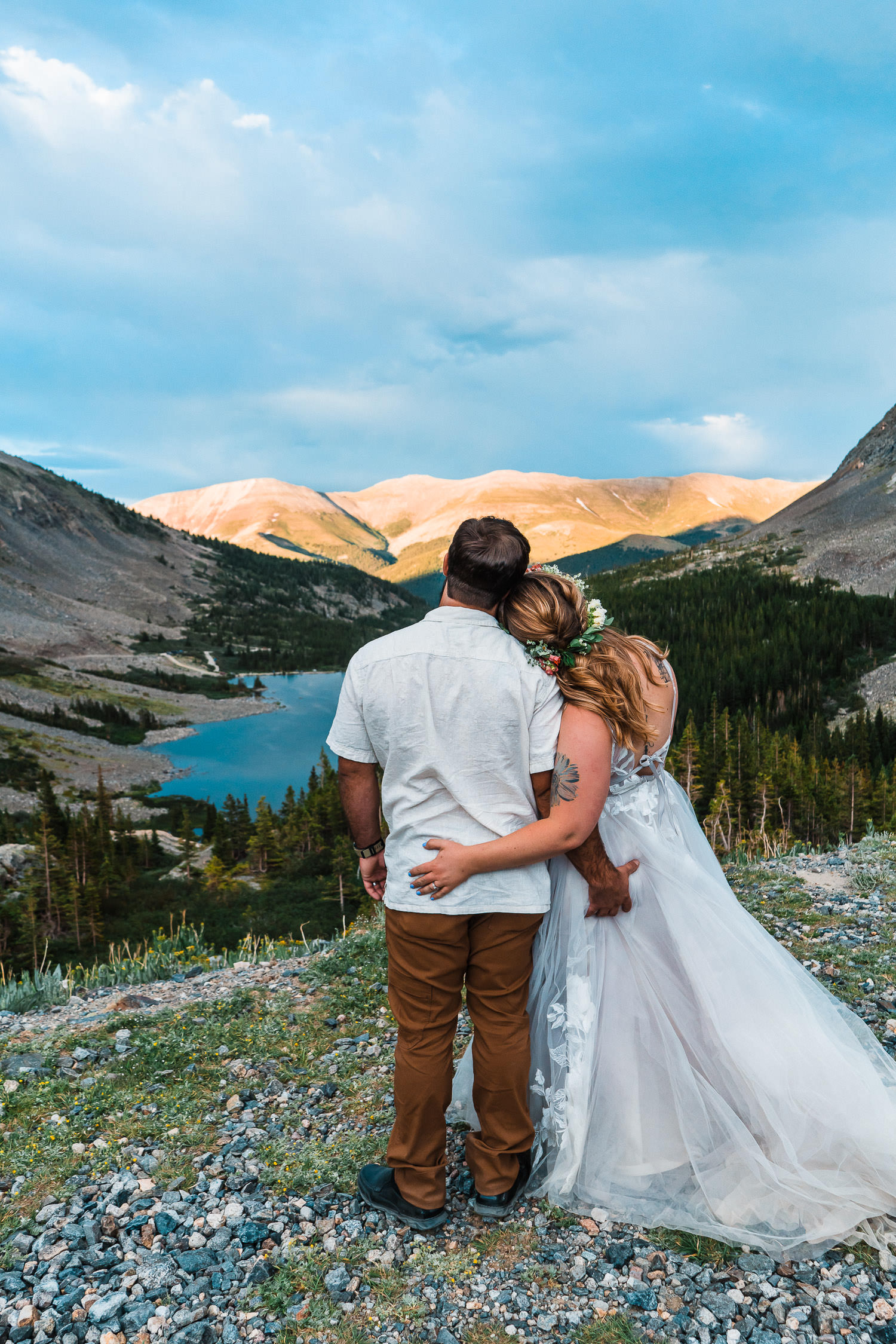 bride and groom share a booty squeeze while overlooking Blue Lakes