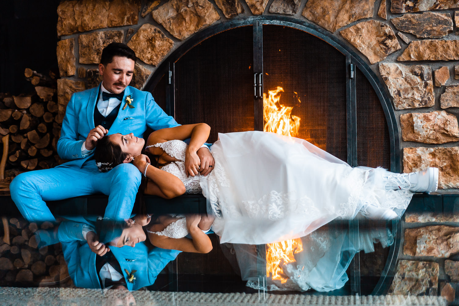 Bride and Groom by Cozy Fireplace
