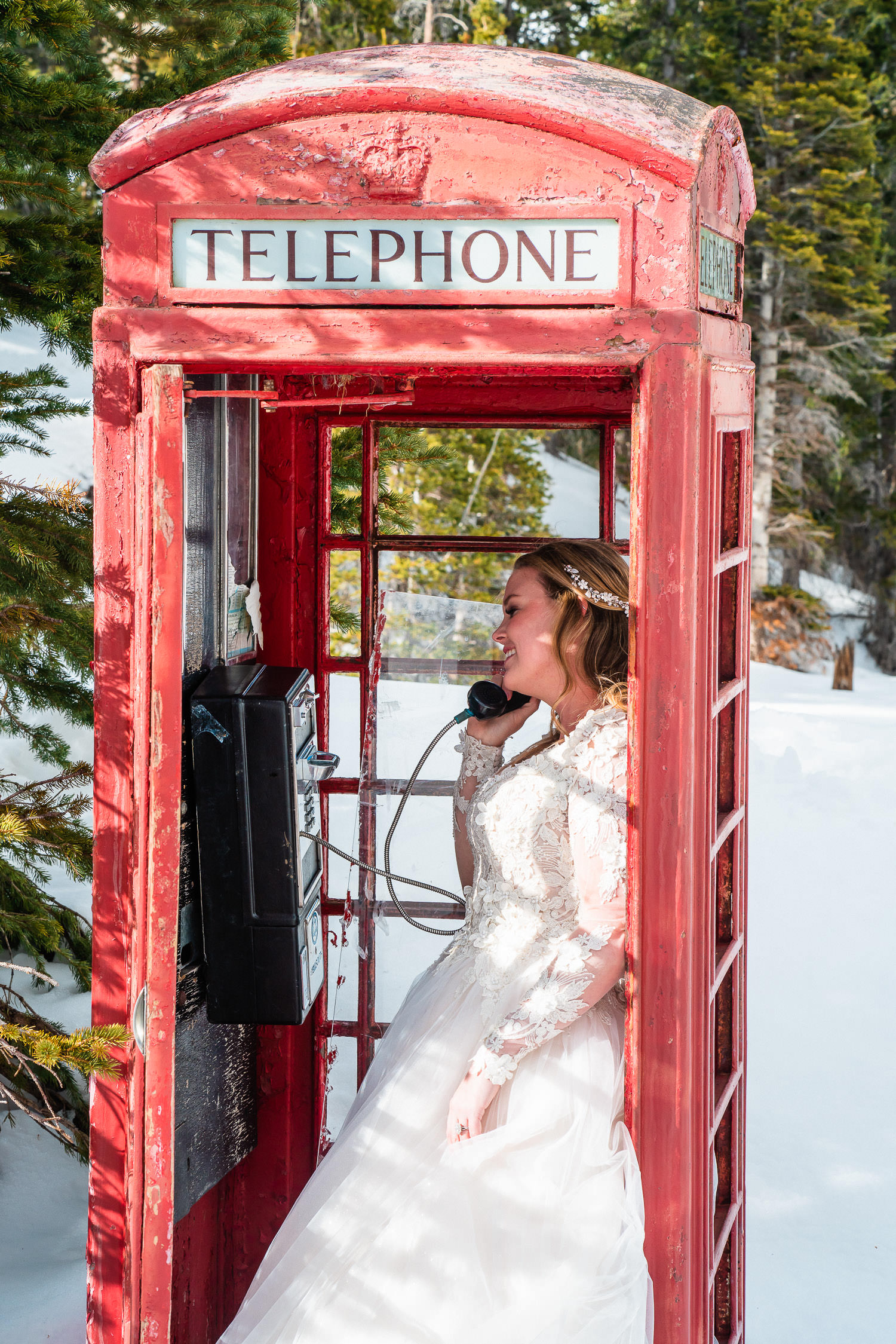 bride in a telephone booth