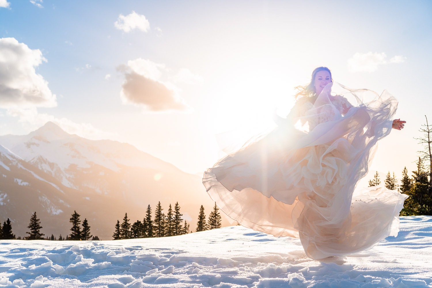 bride twirling in the snow
