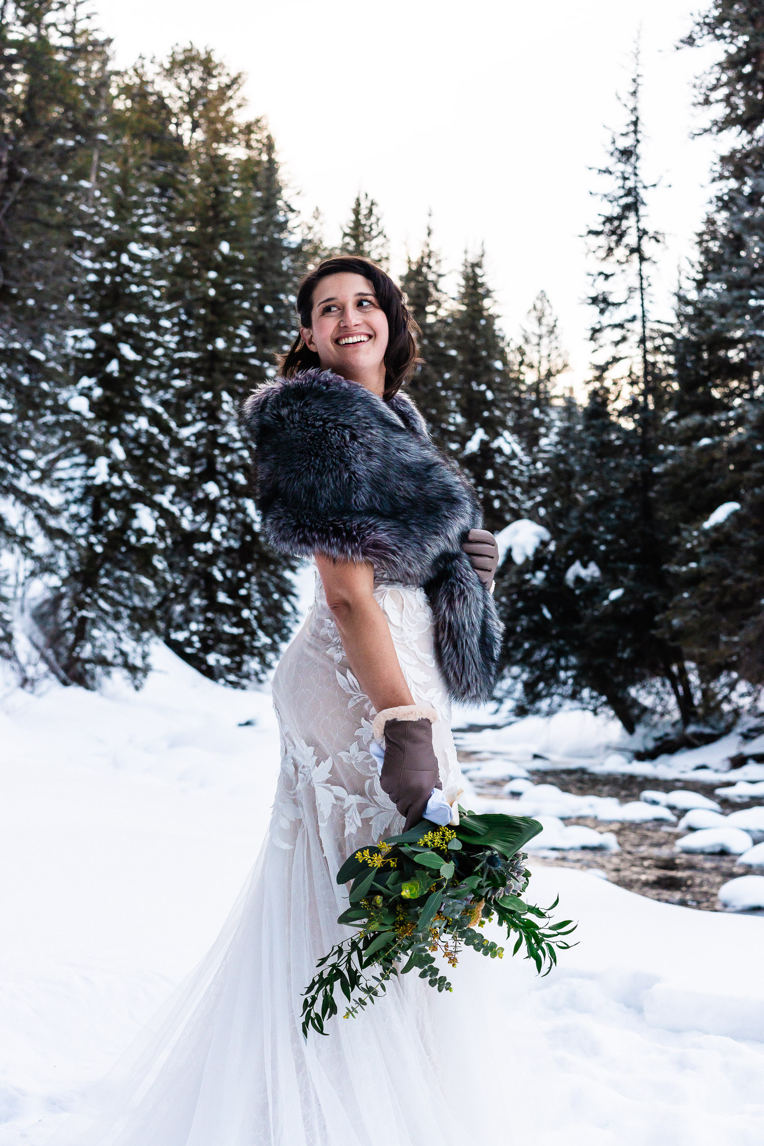 lesbian bride with her shawl and bouquet LGBTQ+ Elopement