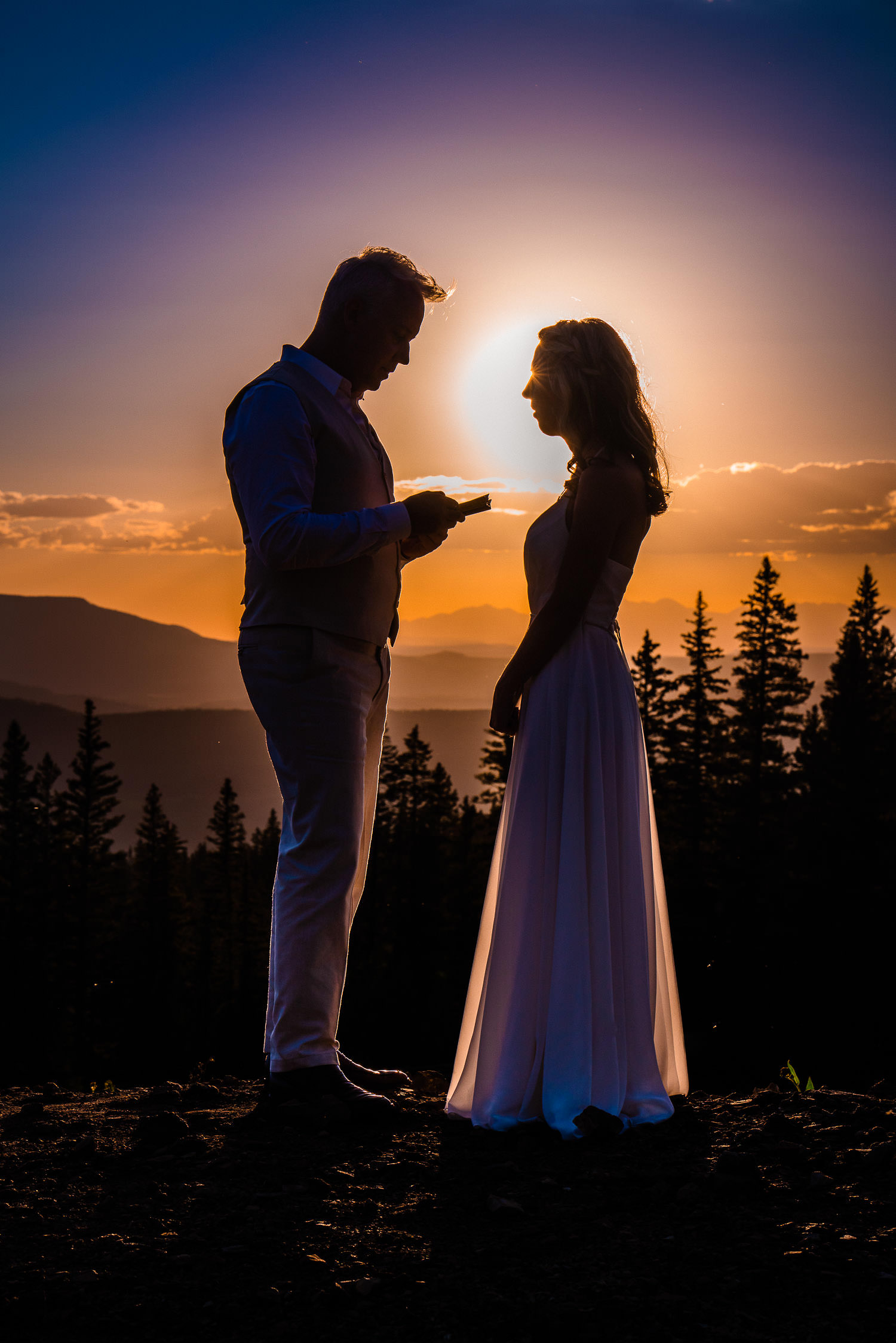 Bride and groom self solemnizing in the Colorado mountains at sunset