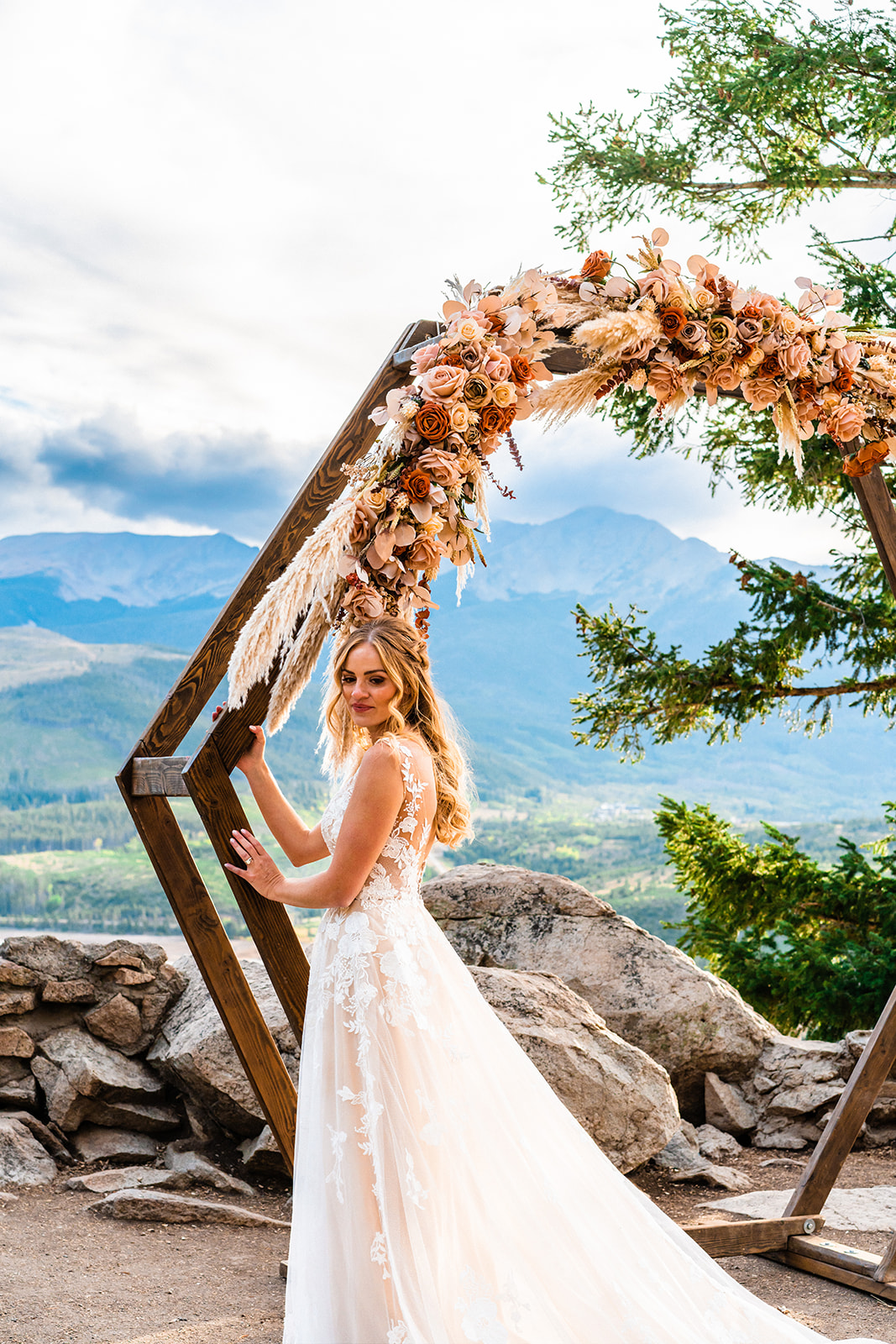 Bridal Portraits under Wedding Arch for her Colorado Micro Wedding