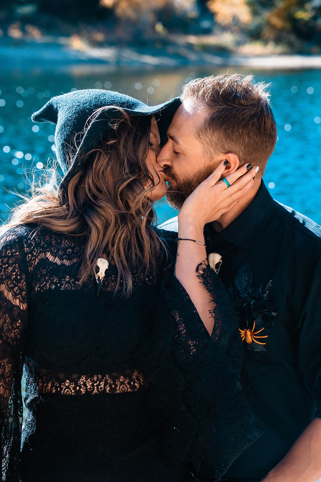 Bride and groom kissing during their halloween elopement in Colorado