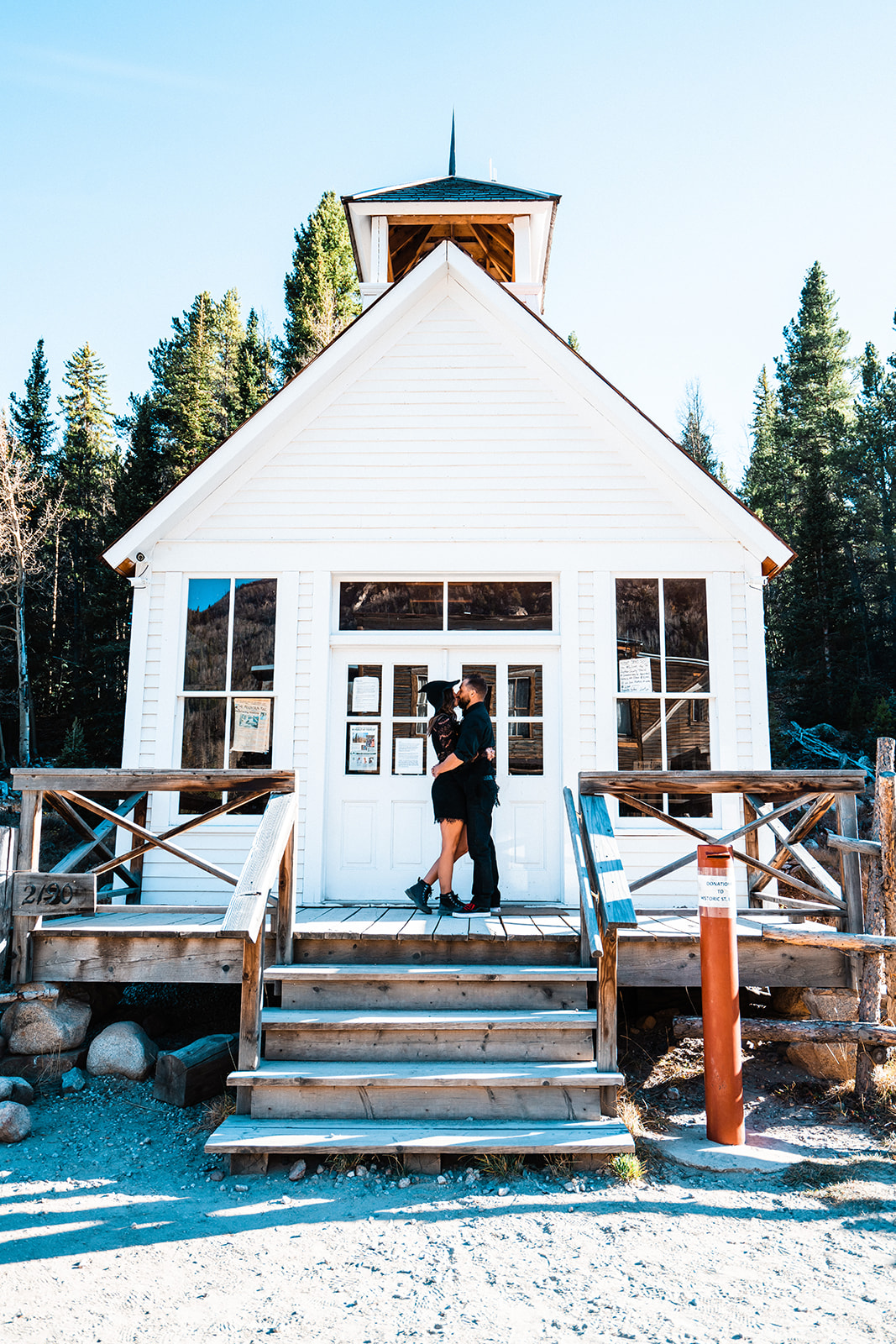 Bride and groom visiting a ghost town for their halloween elopement