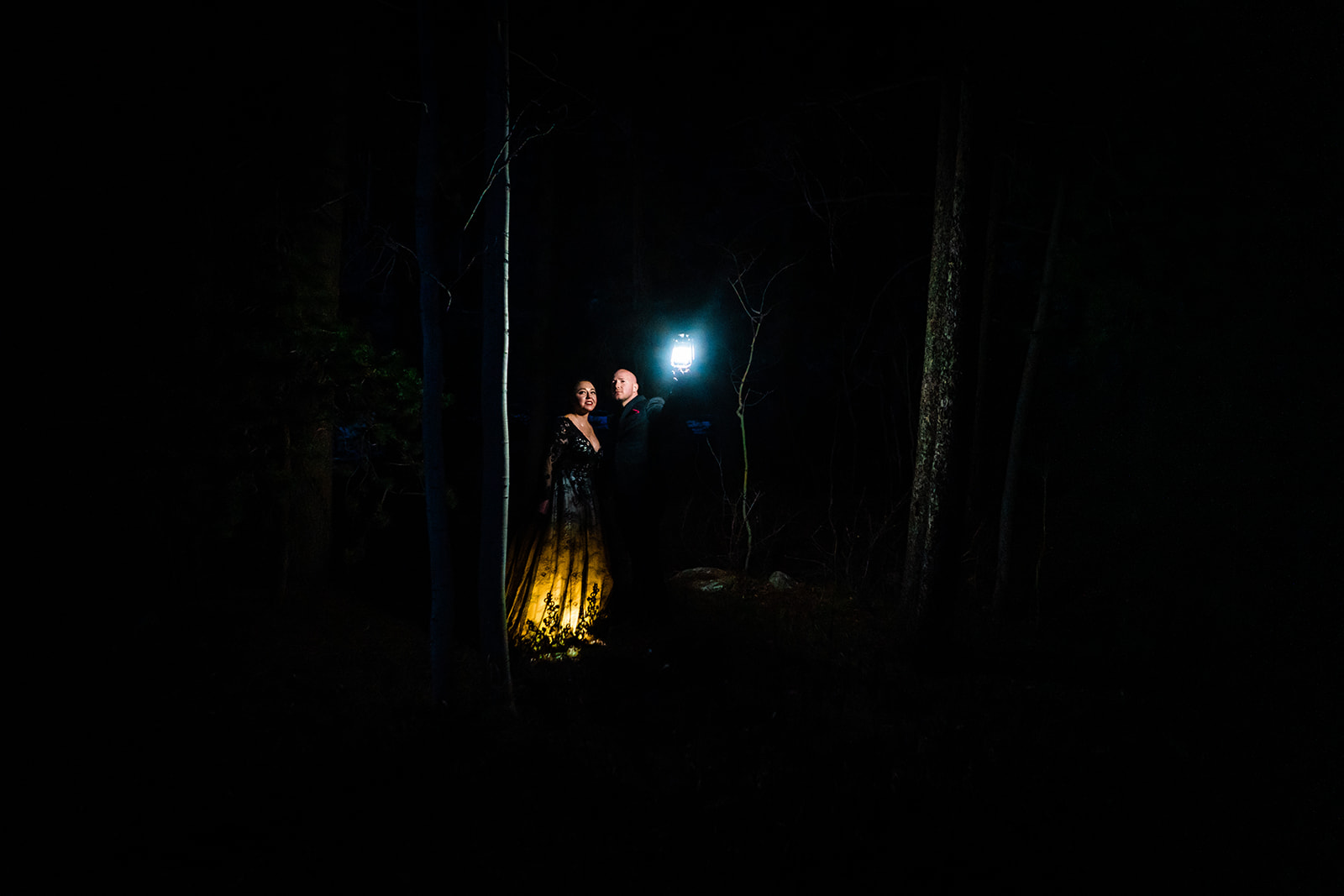 Halloween elopement with a black wedding dress in the woods