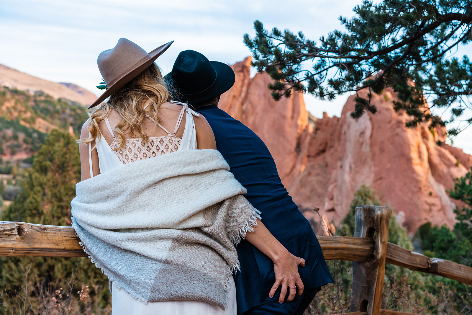 Fiancée squeezing her partners butt at the Garden of the Gods