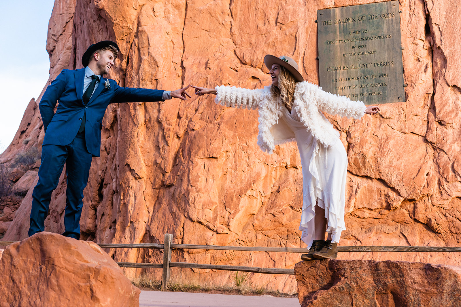 Newly engaged couple acting silly at the Garden of the Gods