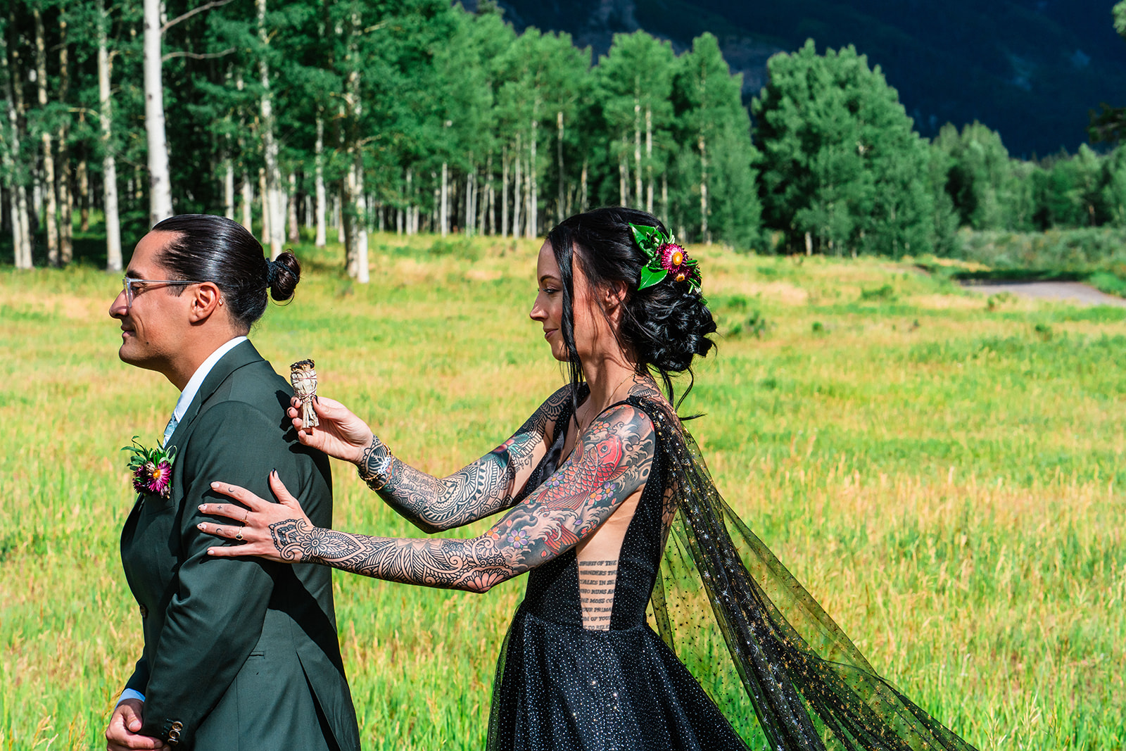 Bride and groom cleansing each other with sage and self-solemnized