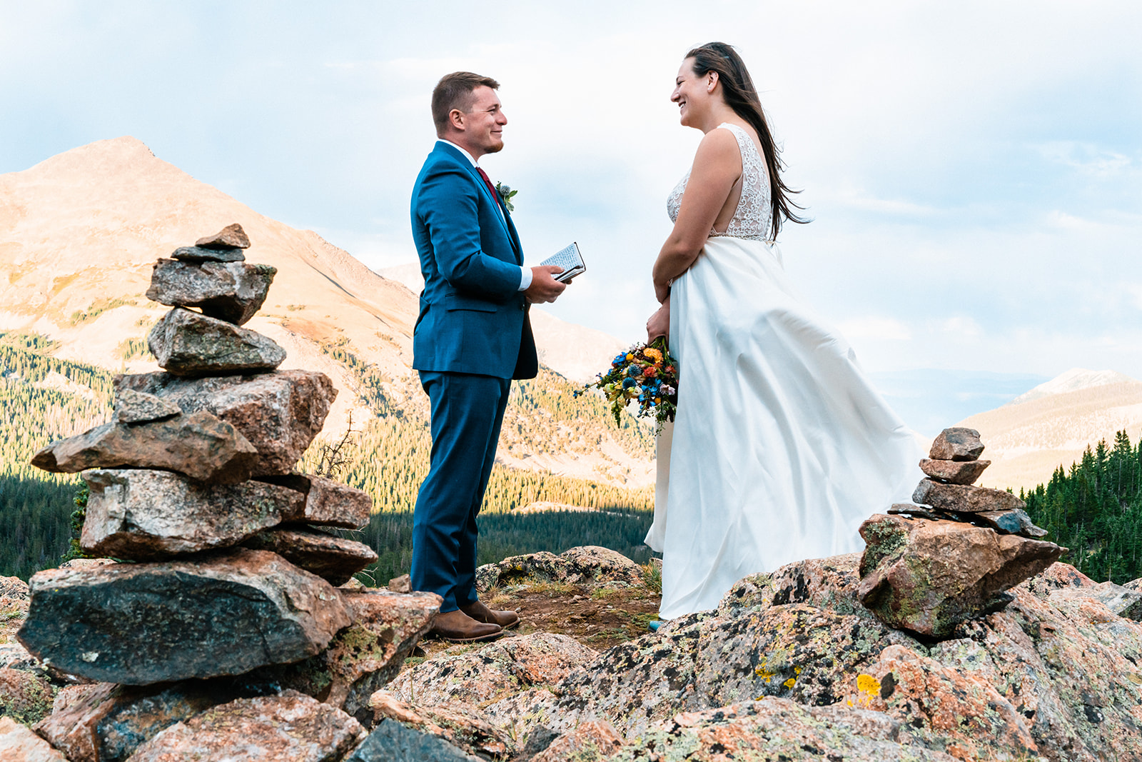Bride and groom exchanging vows in the Colorado mountains