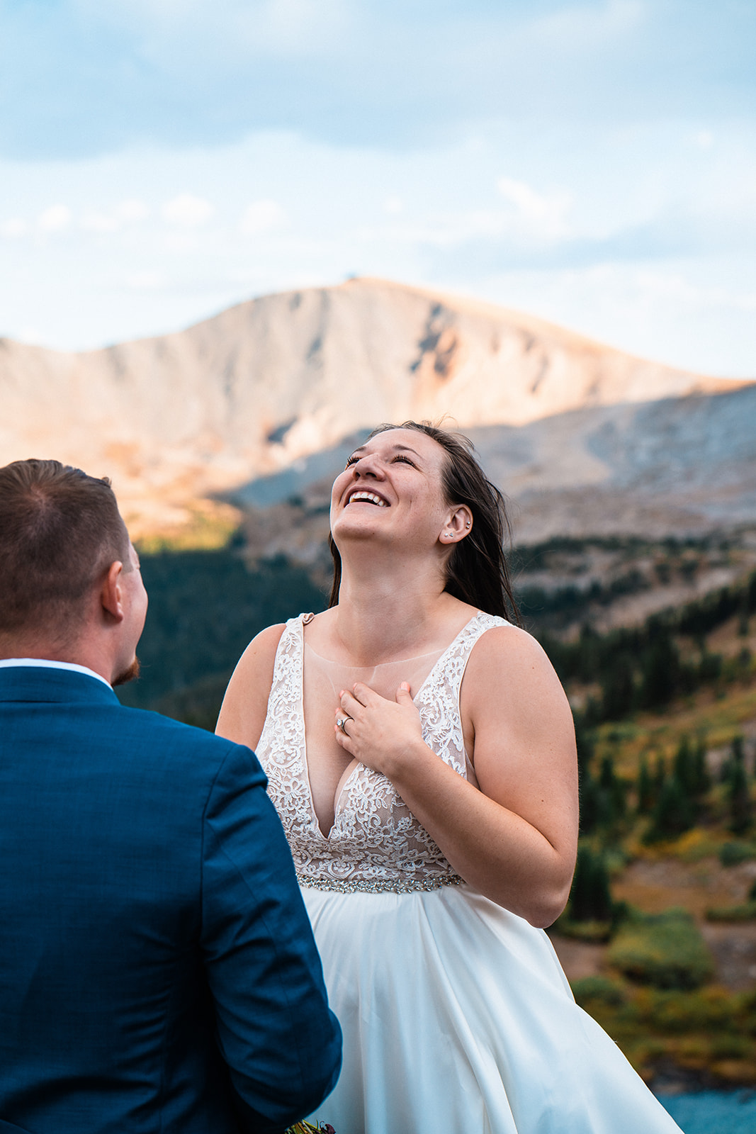 Bride and groom exchanging vows in the Colorado mountains