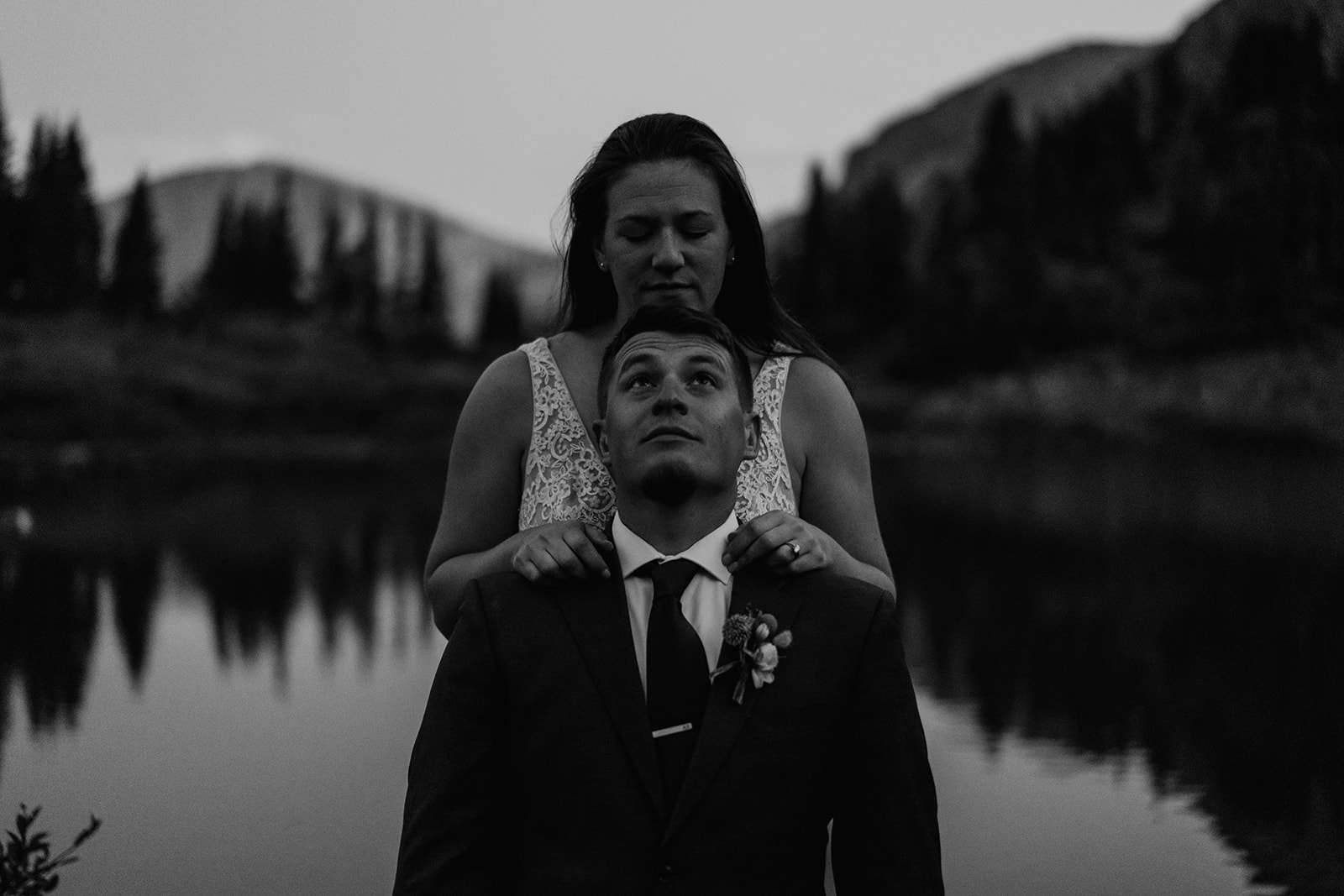 Black and white photo of bride and groom at Alpine Lake