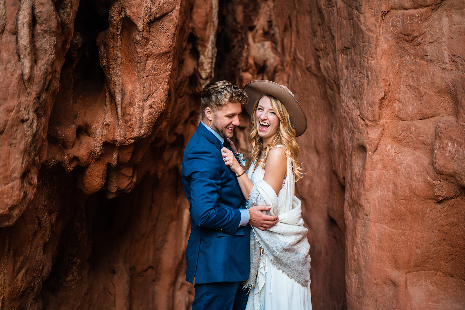 Engaged couple acting silly at the Garden of the Gods