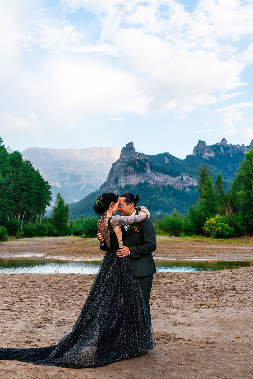 Bride and groom dancing in the Colorado mountains
