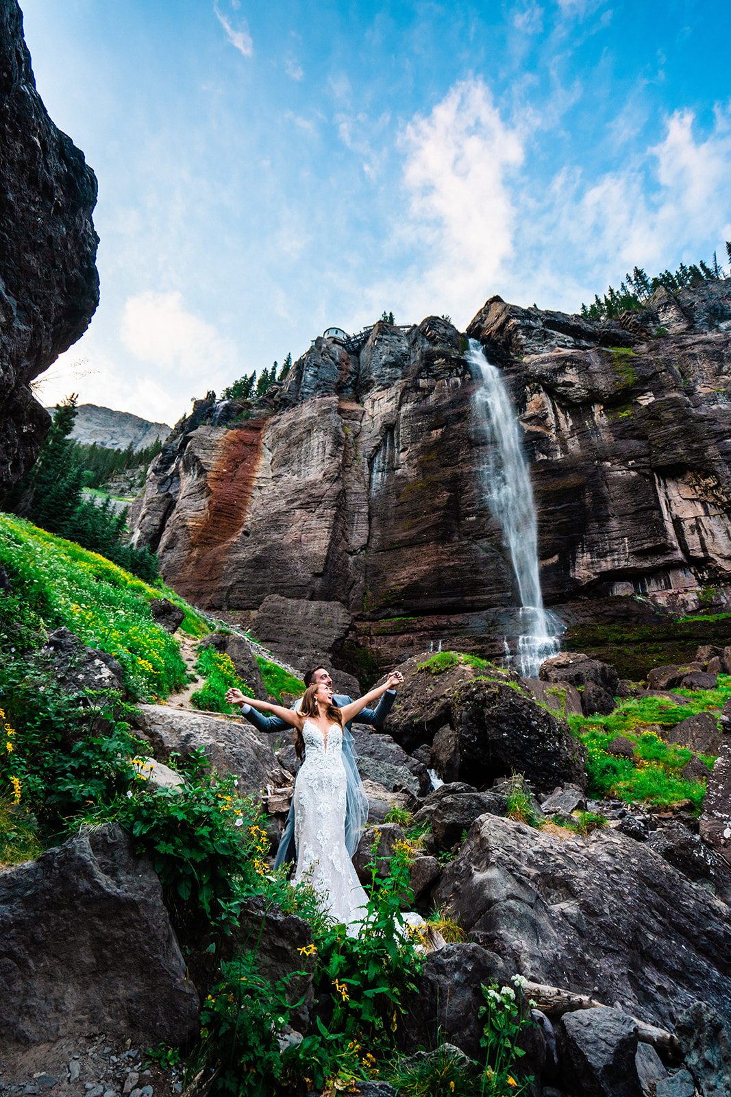 Adventure Bridal Veil Falls elopement day with dreamy backdrops and mountain views in Colorado