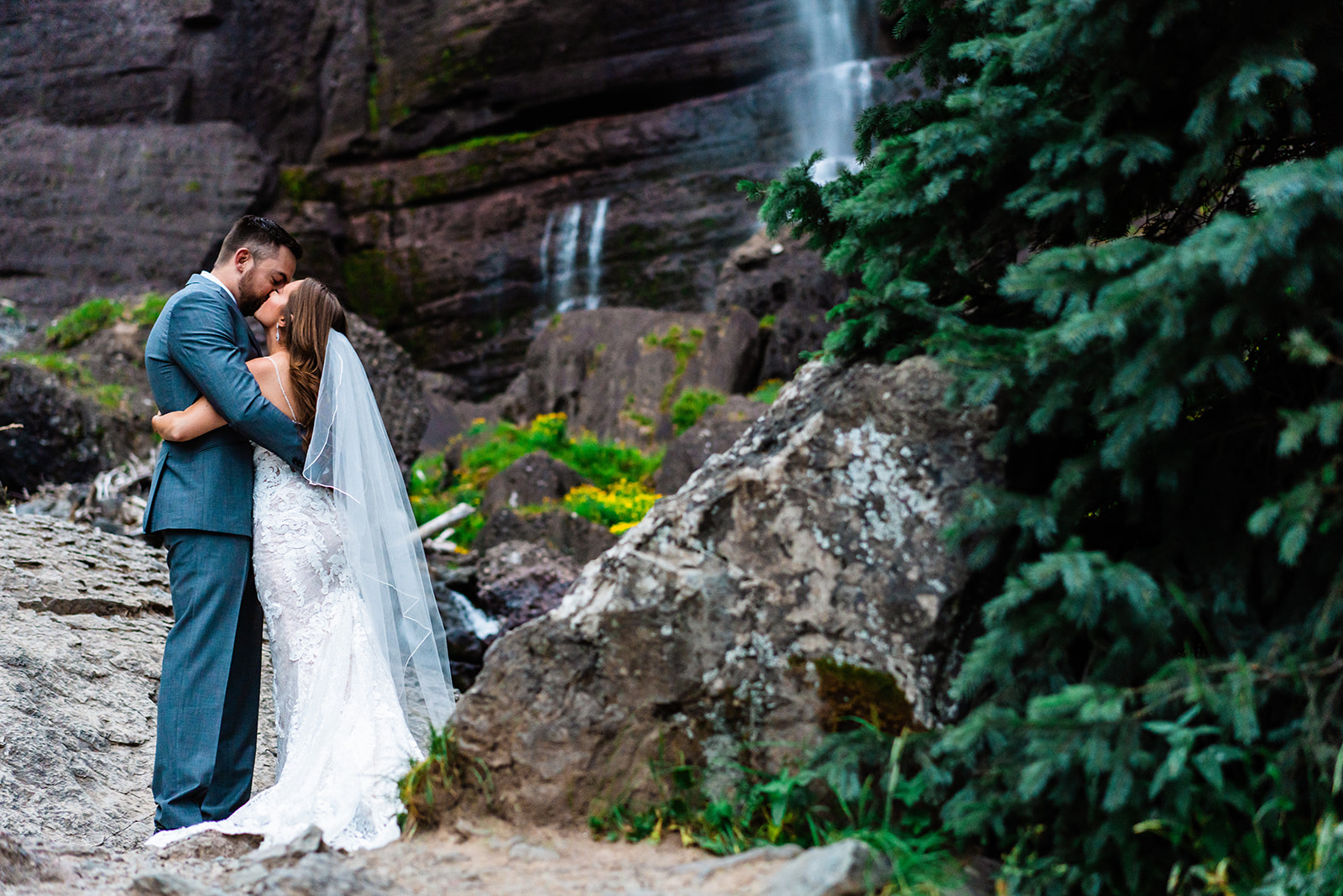 Bride and groom first look at Bridal Veil Falls