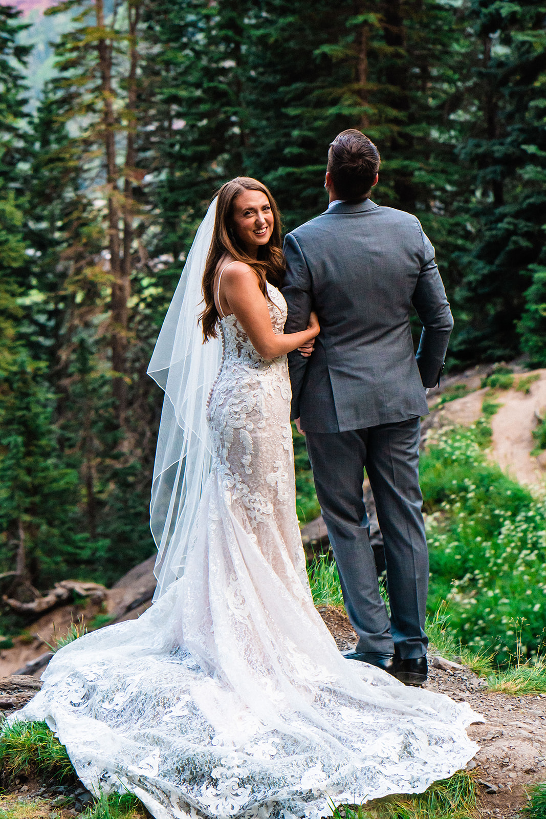 Adventurous bride and groom at Bridal Veil Falls