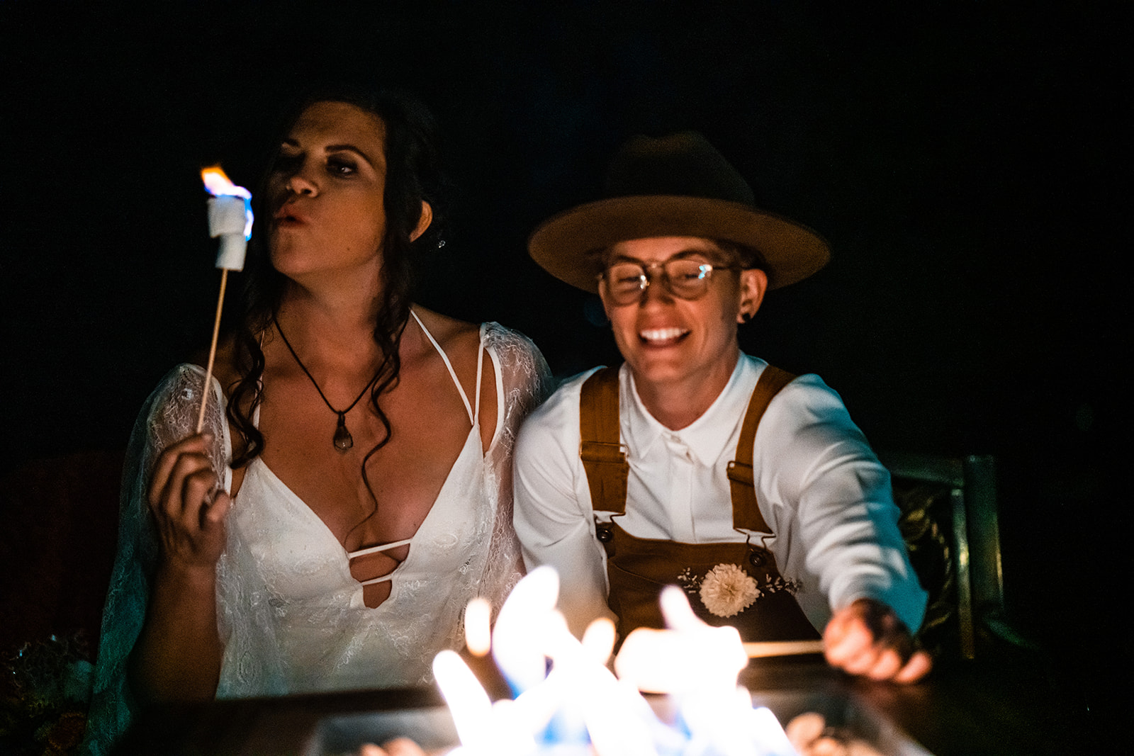 Lesbian couple making S'mores as their wedding ritual