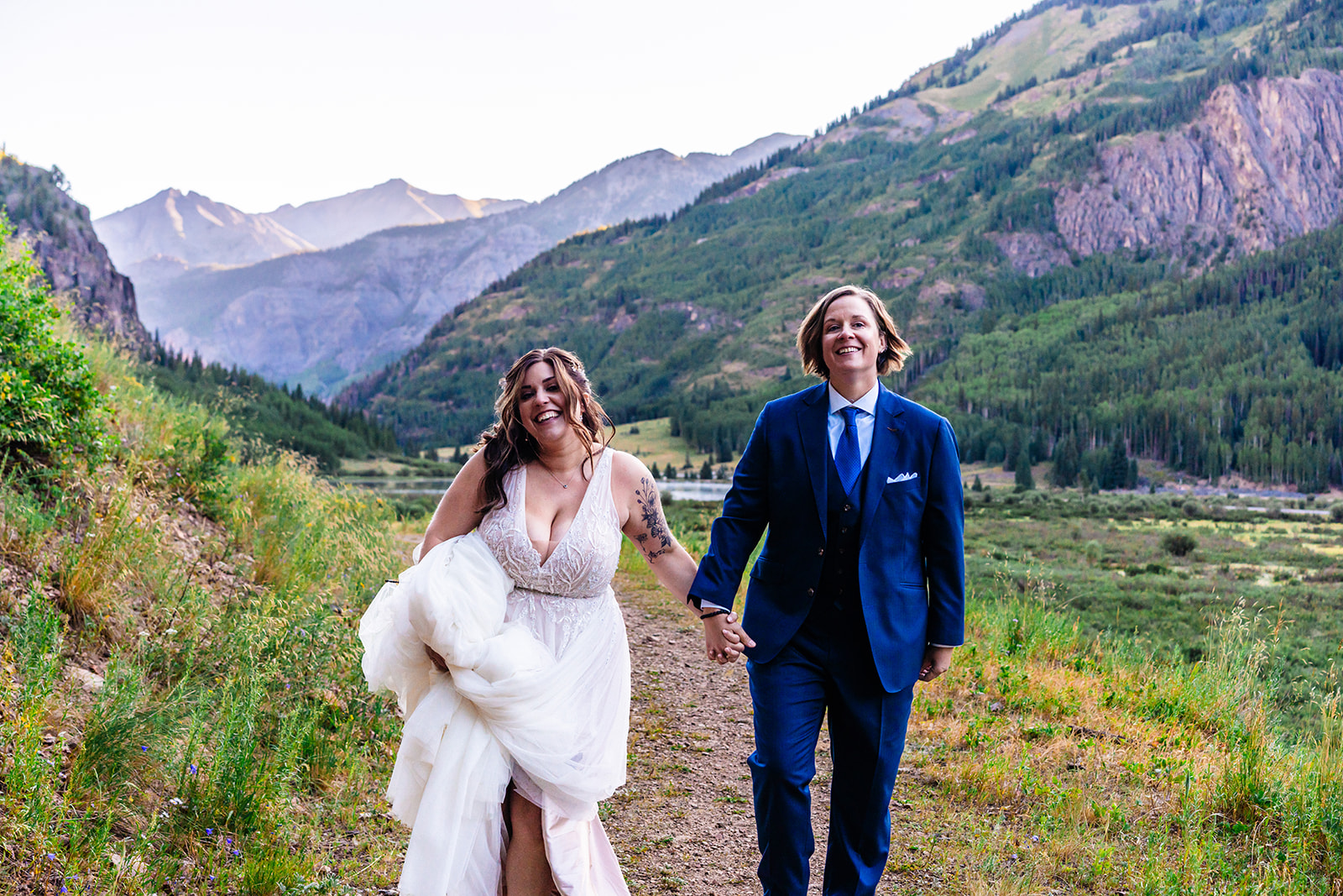 Beautiful lesbian couple smiling walking in Ouray Colorado