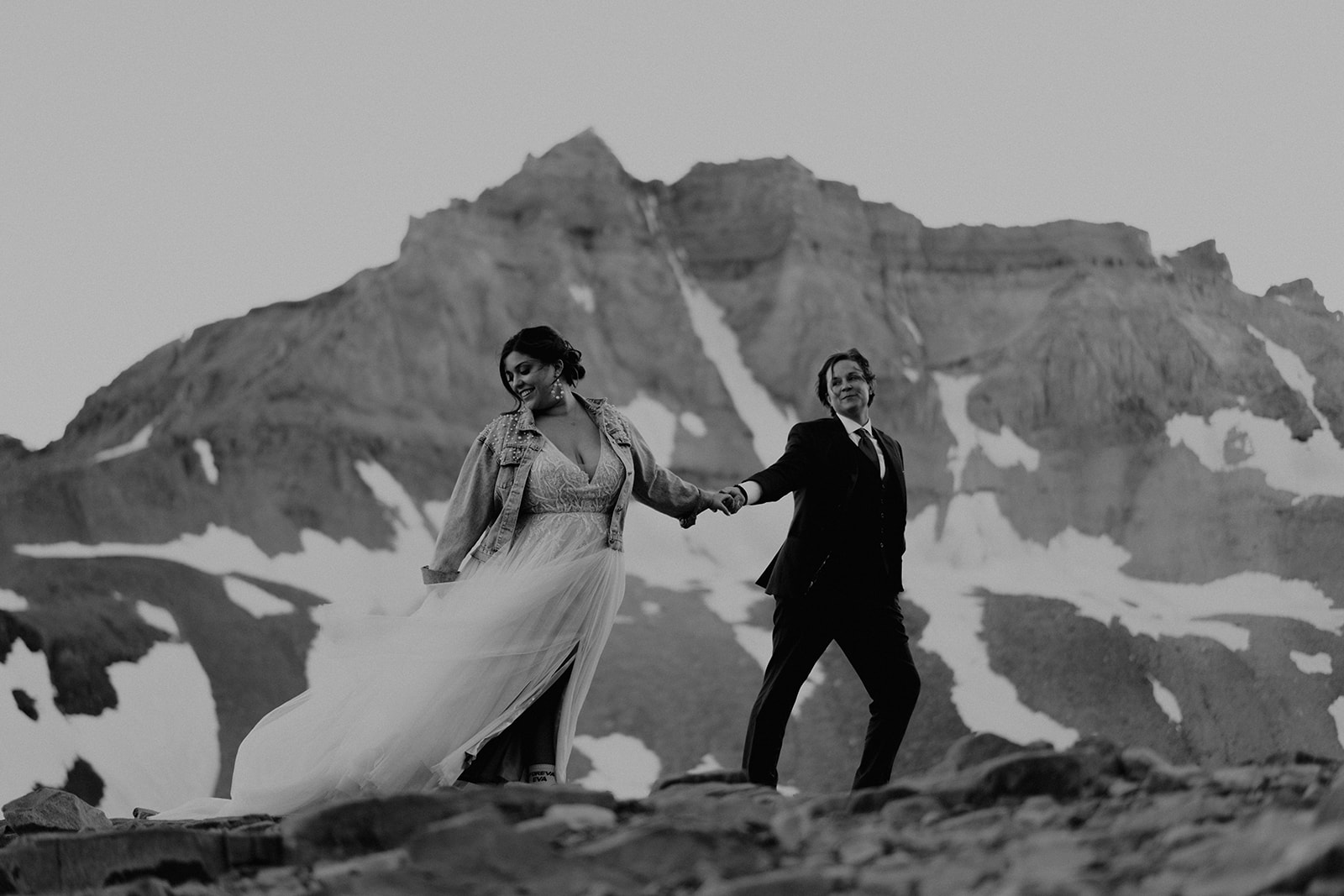 Black and white photo of couple posing in the mountains of Colorado