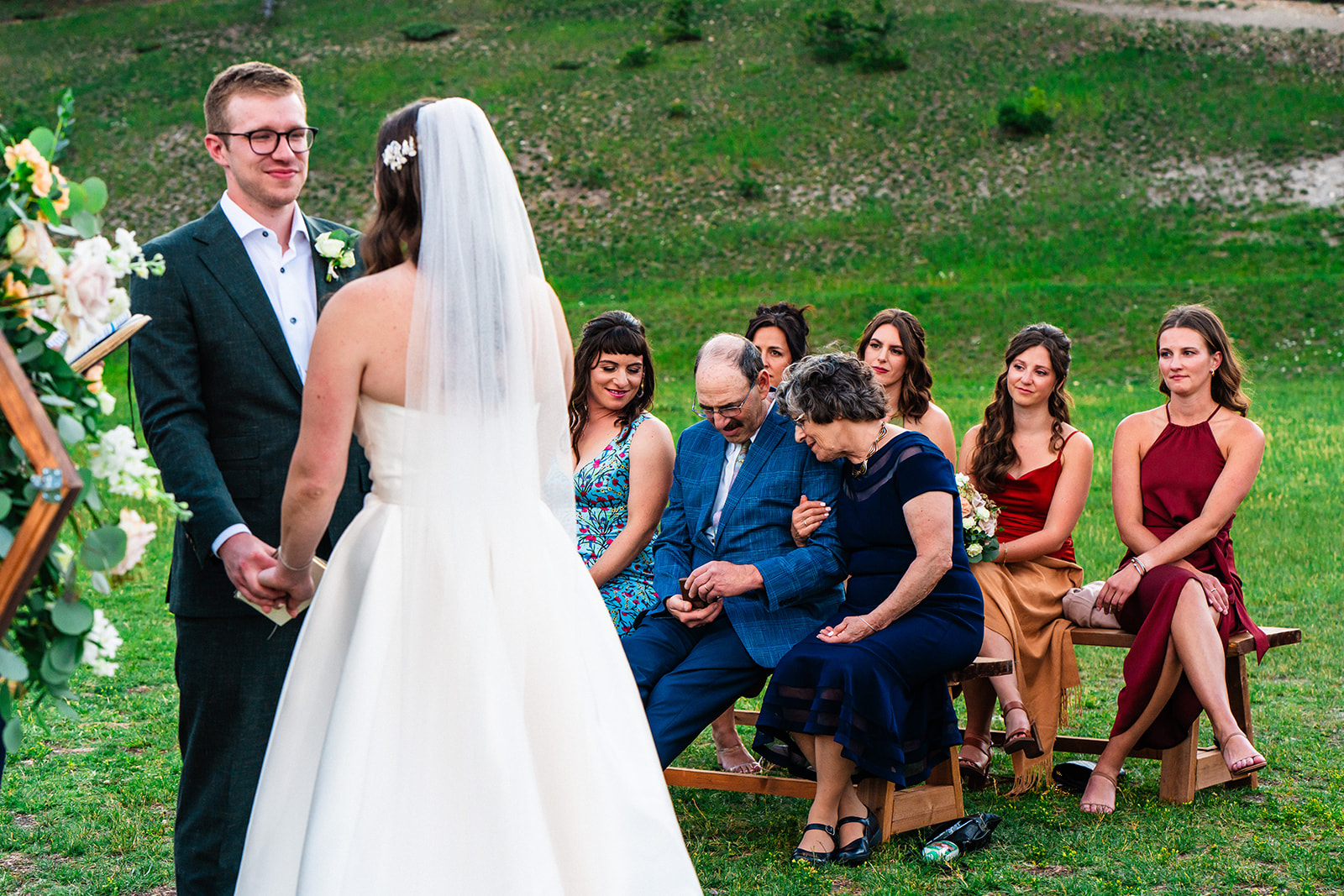 Bride and grooms family during intimate Banff wedding ceremony