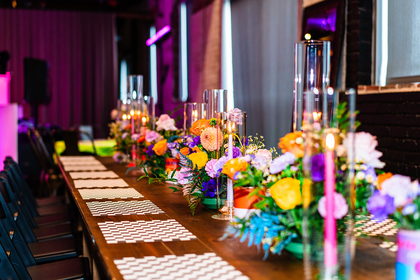 Stunning wedding tablescape with colorful florals and decor