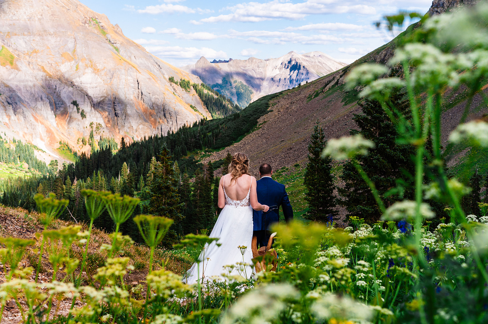 Adventurous bride and groom at Yankee Boy Basin in Ouray