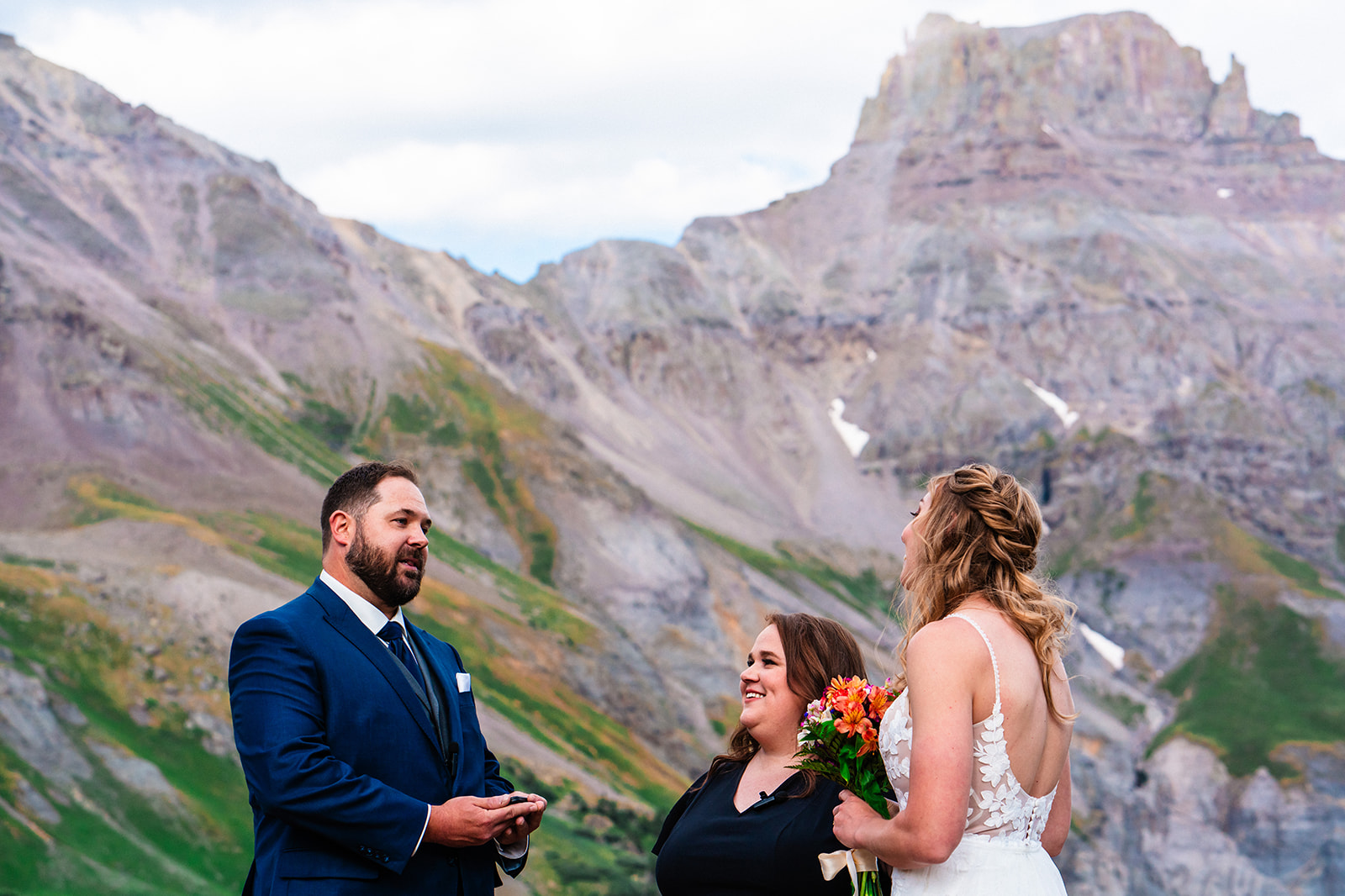 Bride and groom exchanging vows at the Yankee Boy Basin in Colorado
