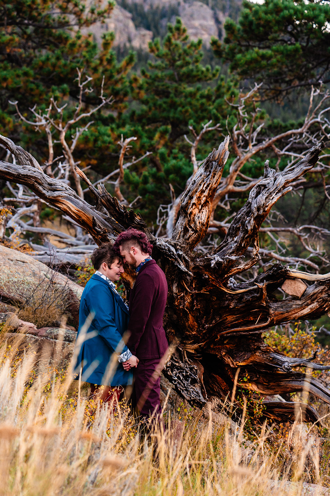 Newlyweds holding one another during their Brainard lake elopement