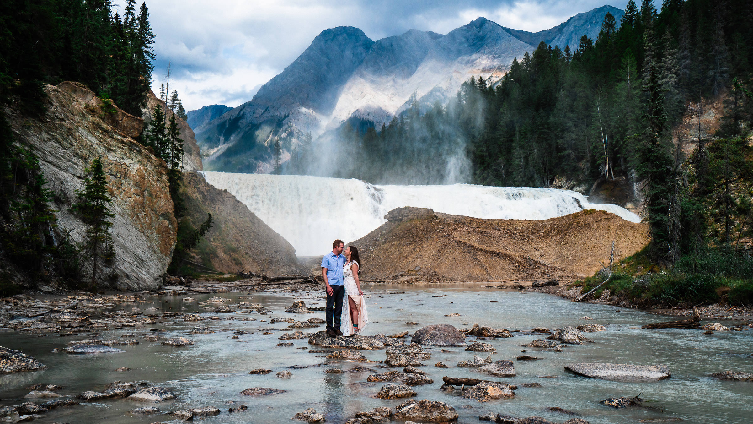 adventure engagement photos at waterfall in Yoho National Park