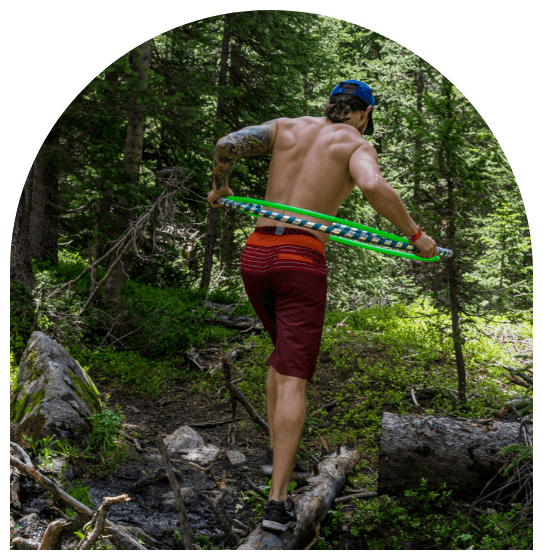 kevin hoola hooping in the forest